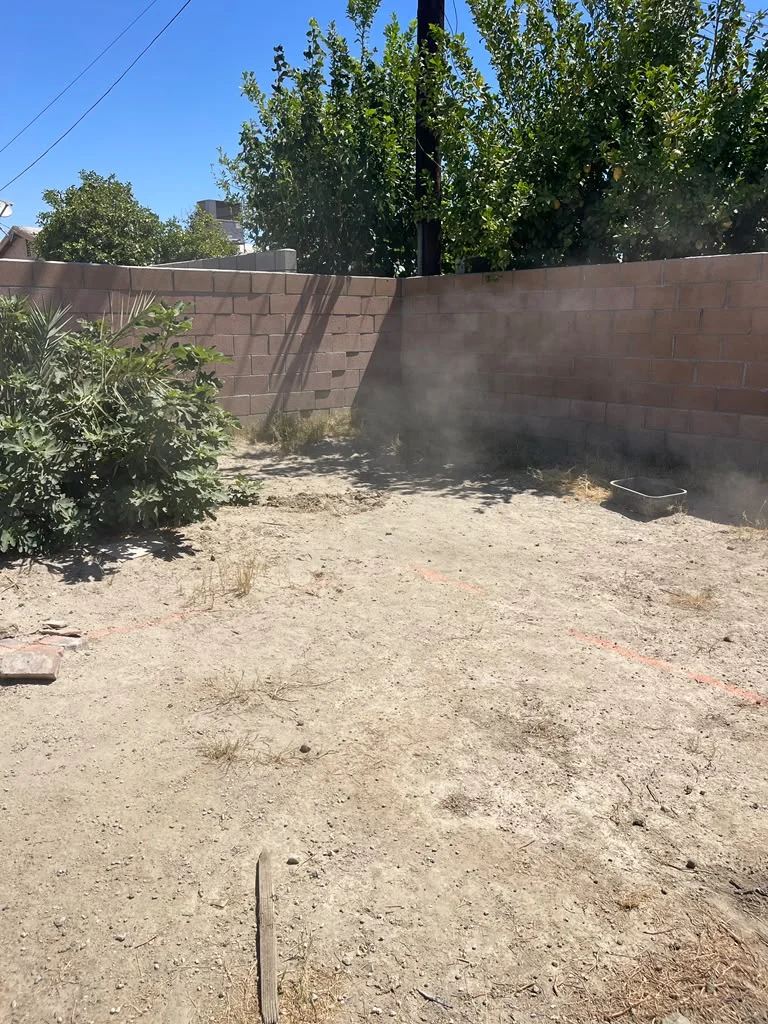 Outdoor space prior to hardscape and turf installation — photo 4