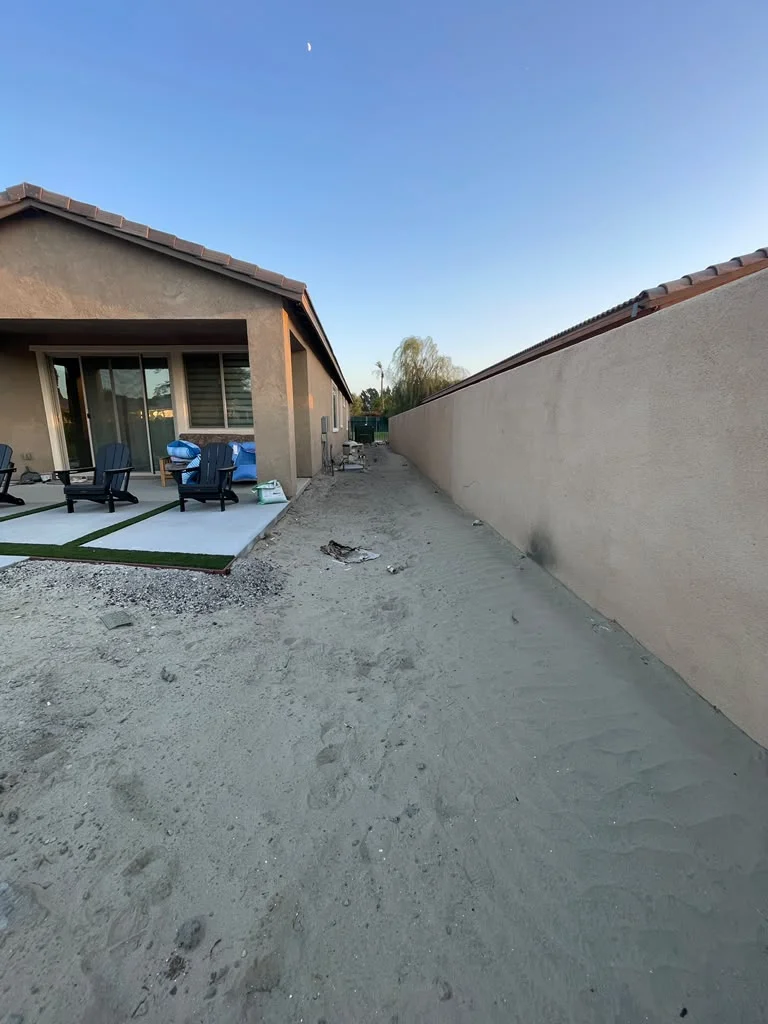 Outdoor space before stepping stone and gravel installation — photo 3