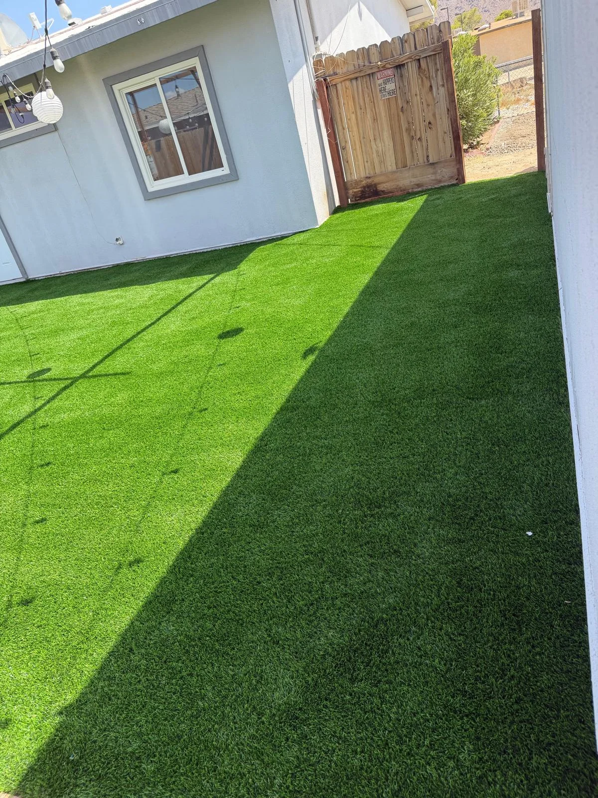 Completed artificial grass installation — photo 3